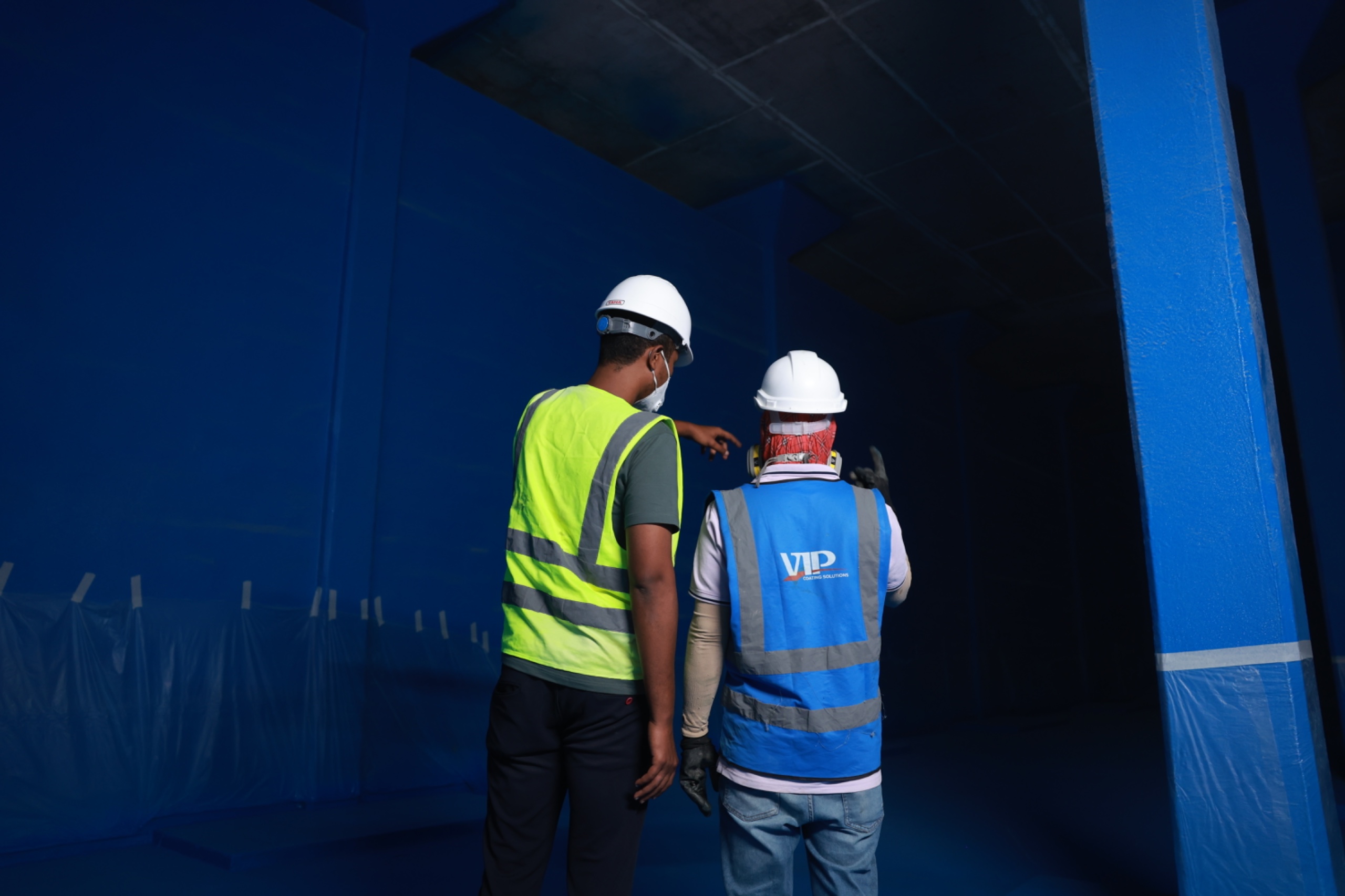 Professional spray painting application of protective coating